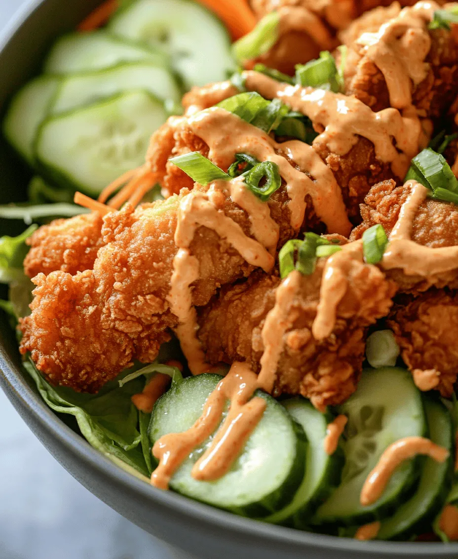 The Bang Bang Chicken Bowl is a deliciously enticing dish that perfectly marries bold flavors with eye-catching presentation. This culinary creation features crunchy, savory chicken pieces nestled atop a bed of fresh vegetables, all drizzled with a creamy and spicy sauce that packs a punch. It’s a meal that not only tantalizes the taste buds but also brings a vibrant splash of color to your dinner table.
