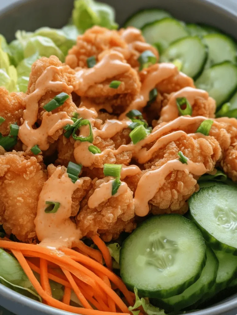 The Bang Bang Chicken Bowl is a deliciously enticing dish that perfectly marries bold flavors with eye-catching presentation. This culinary creation features crunchy, savory chicken pieces nestled atop a bed of fresh vegetables, all drizzled with a creamy and spicy sauce that packs a punch. It’s a meal that not only tantalizes the taste buds but also brings a vibrant splash of color to your dinner table.