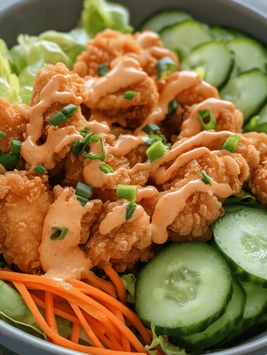 The Bang Bang Chicken Bowl is a deliciously enticing dish that perfectly marries bold flavors with eye-catching presentation. This culinary creation features crunchy, savory chicken pieces nestled atop a bed of fresh vegetables, all drizzled with a creamy and spicy sauce that packs a punch. It’s a meal that not only tantalizes the taste buds but also brings a vibrant splash of color to your dinner table.