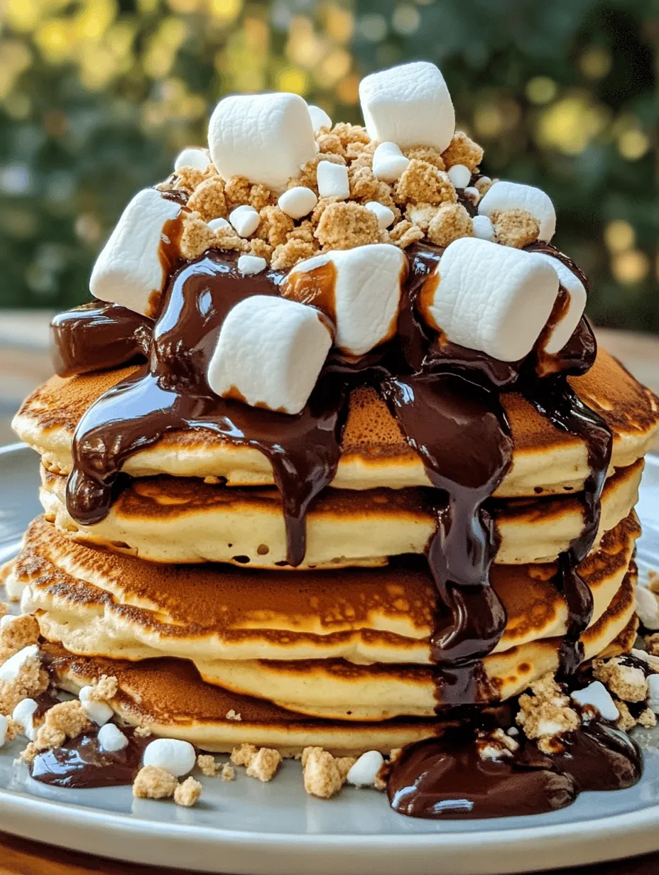 Pancakes are a universal breakfast favorite, cherished for their fluffy texture and warm comfort. Whether enjoyed on a lazy Sunday morning or as a quick weekday breakfast, they hold a special place in the hearts of many. The nostalgia of gathering around a griddle, flipping pancakes, and pouring syrup is an experience that transcends generations. Now, imagine infusing that beloved breakfast staple with the delightful flavors of s’mores—graham crackers, chocolate, and marshmallows. This combination not only elevates the humble pancake but also brings a playful twist to the classic campfire treat, making it an irresistible indulgence for both kids and adults alike.